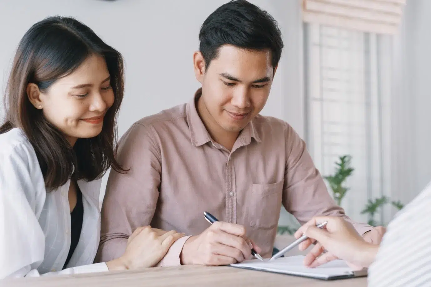 Landlord and adviser discussing refinancing strategy before May 2026